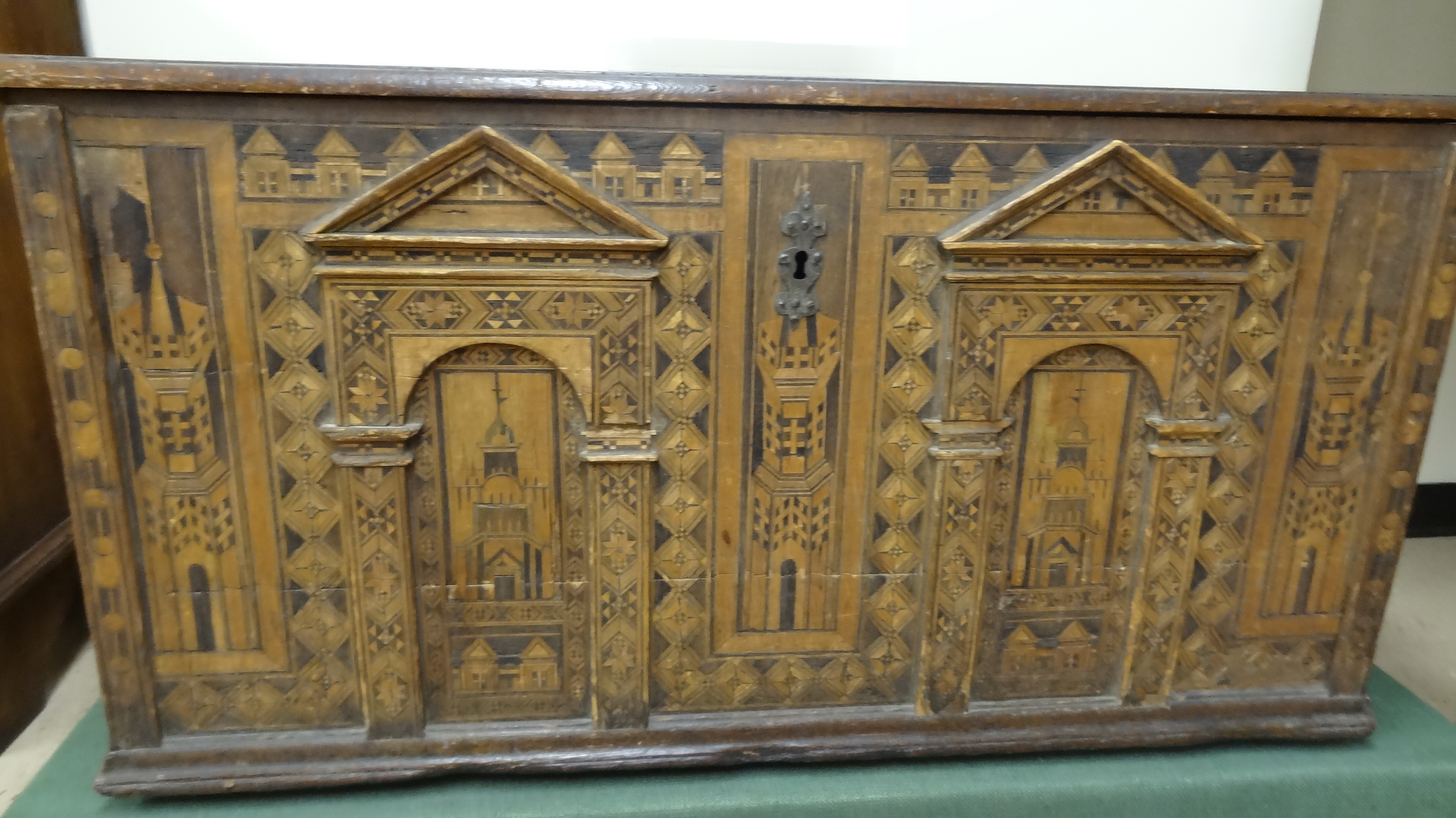 An ornate marquetry chest which originally belonged to Michael Metcalf