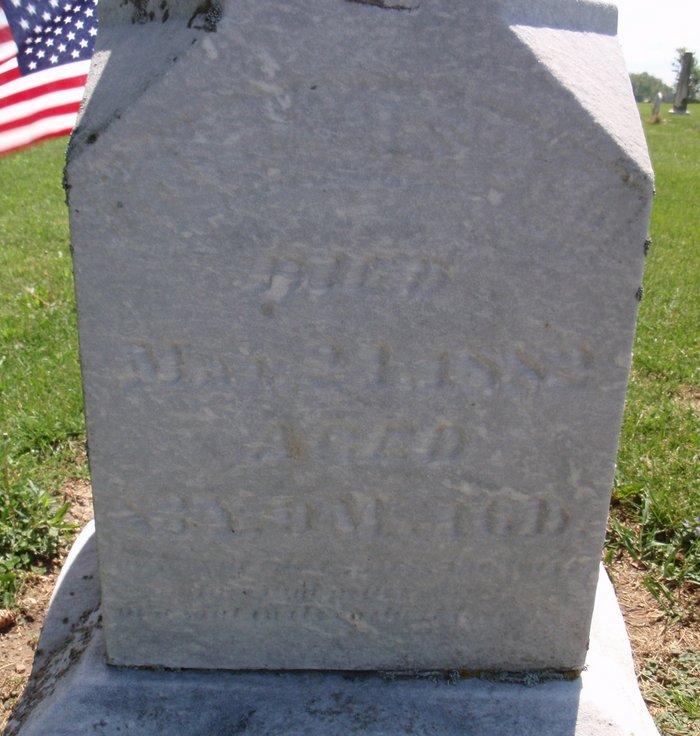 Side of the monument showing James's information