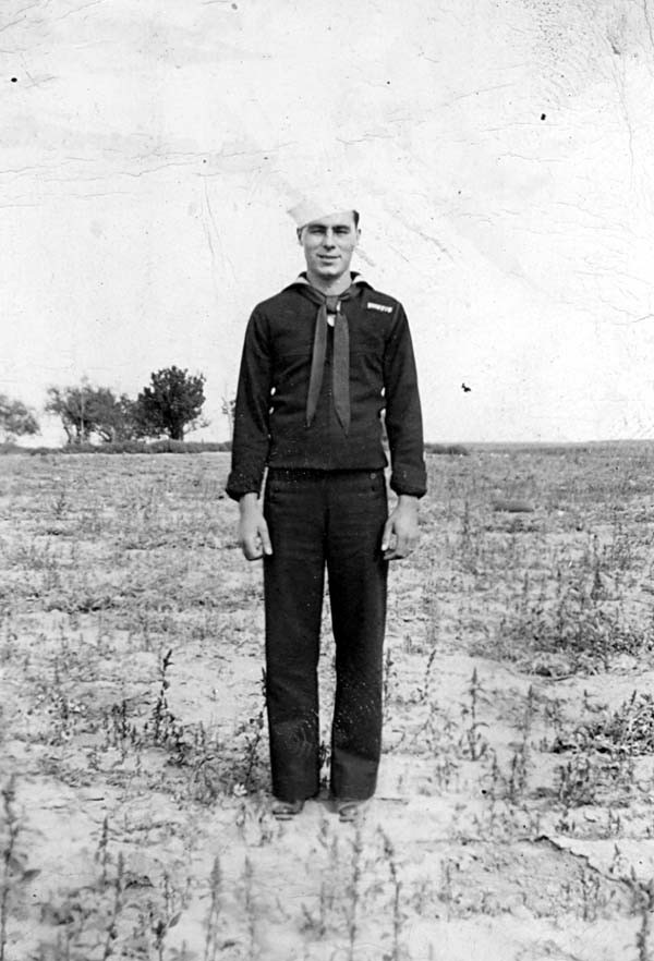 John Mahler in uniform standing in a field