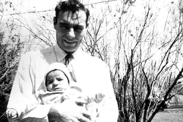 John holding his baby son George