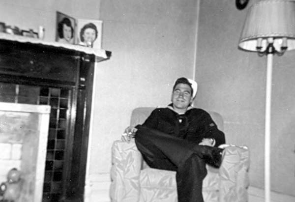 Pete in uniform, sitting in an armchair