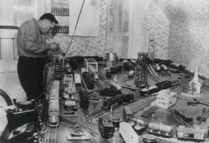 Jacob Mahler and a toy train set