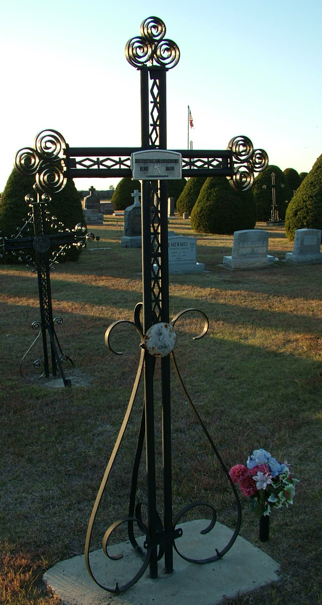 Iron cross grave marker of Madgalene Windholz